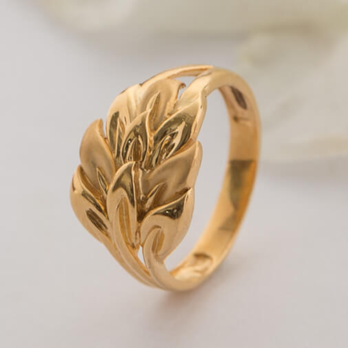 Gold ring design for women in the shape ...