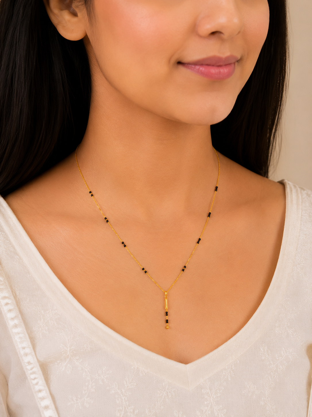 Elegant Linear Drop Short Gold Mangalsutra with Minimal Designer Finish