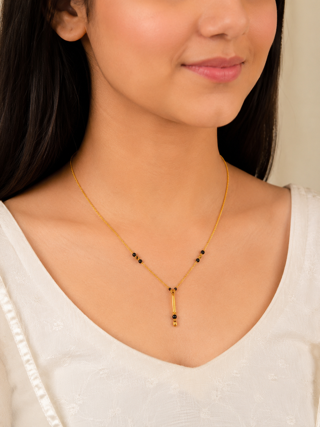Elegant Tassel Drop Short Gold Mangalsutra with Classic Beaded Design