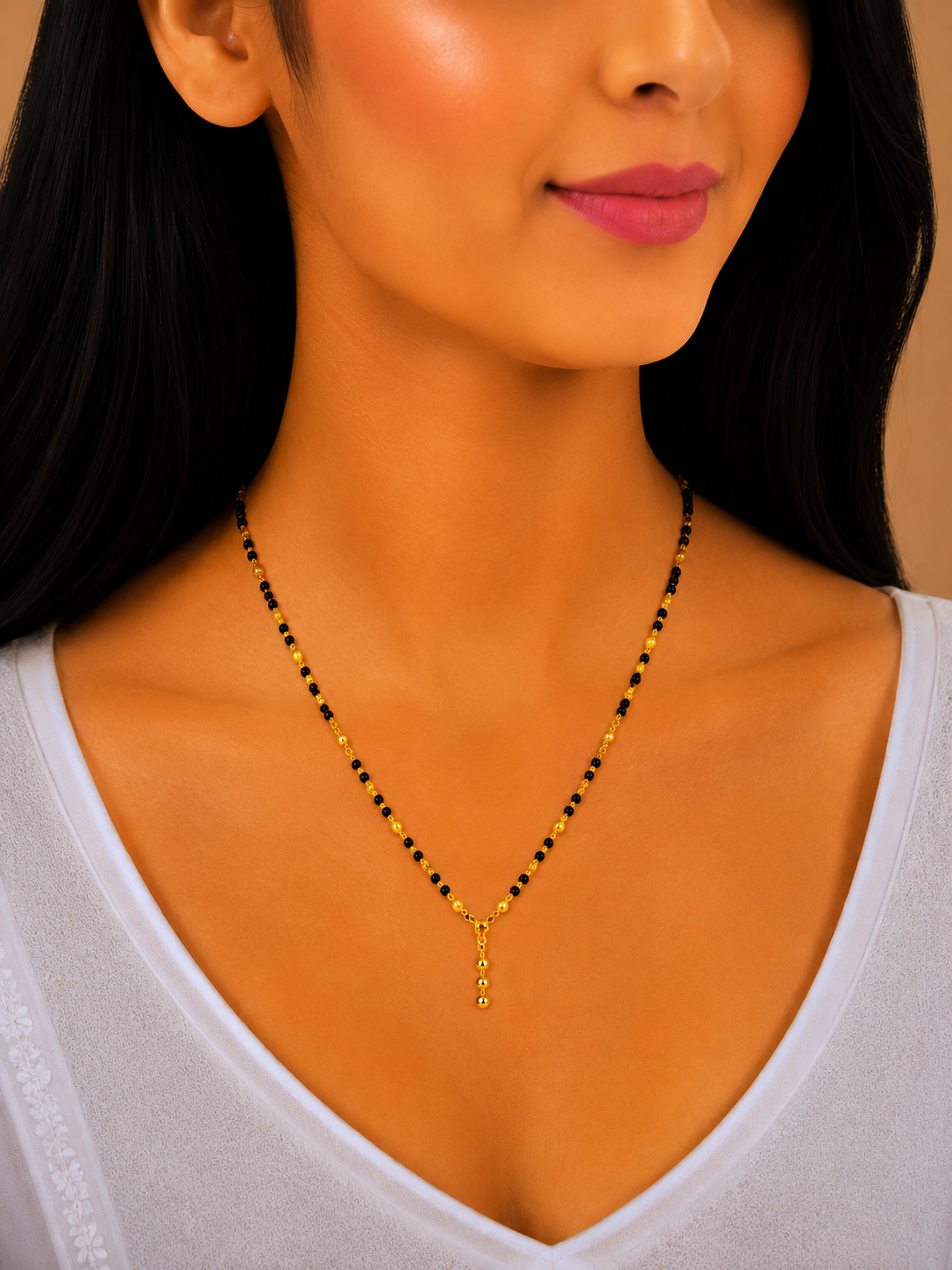 Elegant Black Bead Short Gold Mangalsutra with Drop Pendant Design
