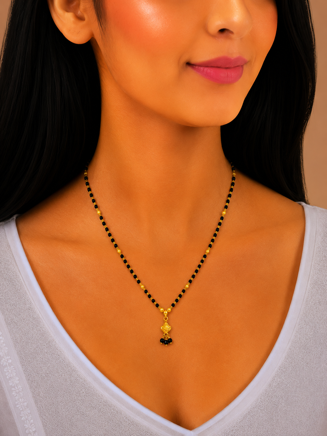 Designer Short Gold Mangalsutra with Classic Black Bead Pendant
